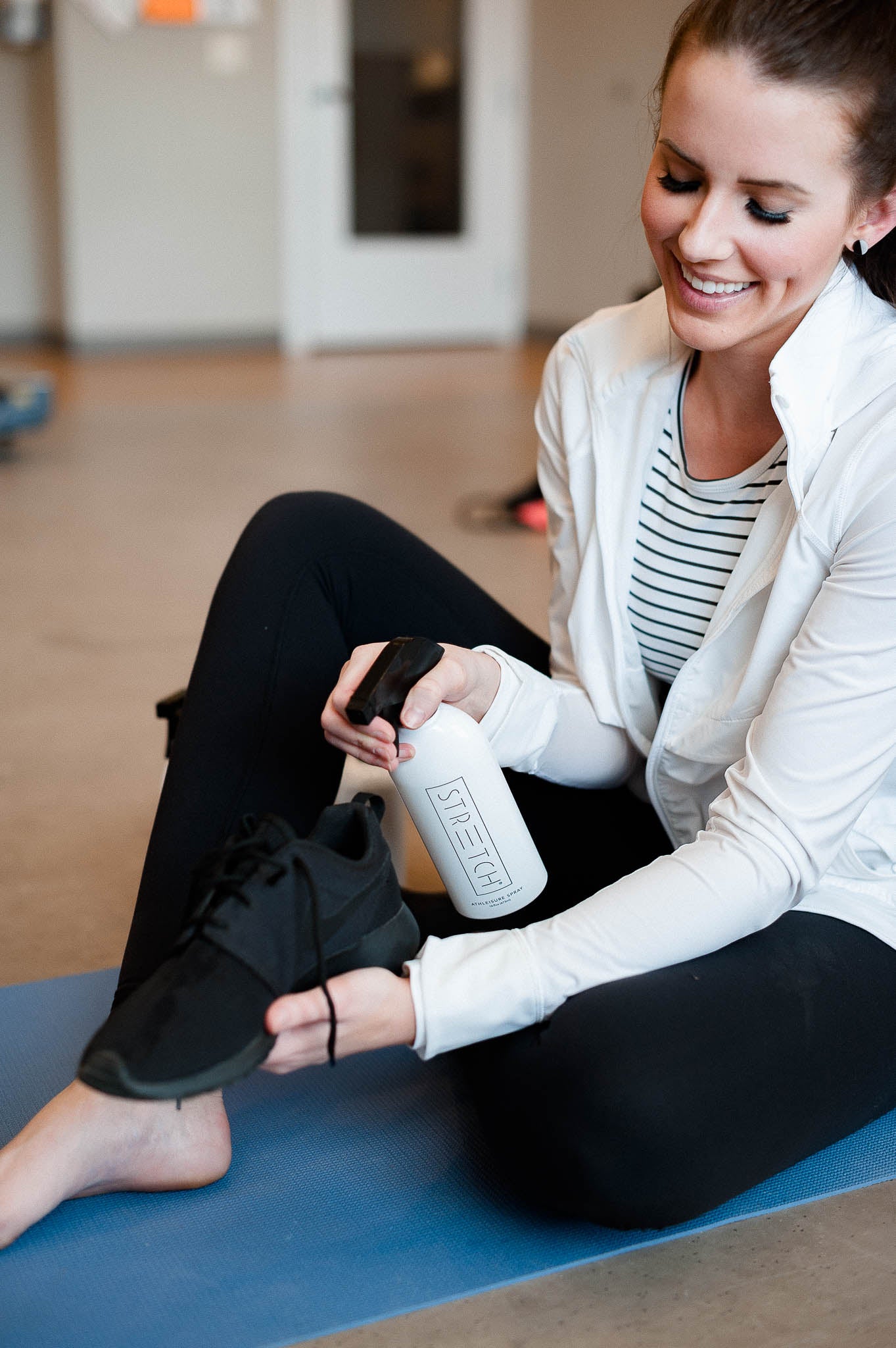 Stretch Odor Eliminator Spray 16 oz Spraying Shoes