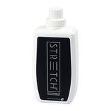 A white bottle of STRETCH Pure Sport Liquid Active Wear Detergent with a black label.